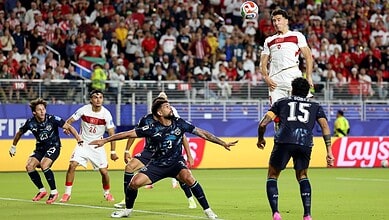 Turkey and Paraguay playes in action during their World Cup match