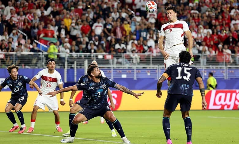 Turkey and Paraguay playes in action during their World Cup match