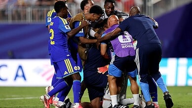 Curacao players celebrate a draw against Ecuador