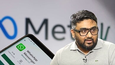 Kunal Shah at a conference, with WhatsApp Messenger app on a phone in foreground.