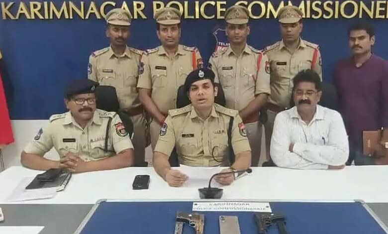 Police officers and officials at a press conference on dacoity case in Karimnagar.