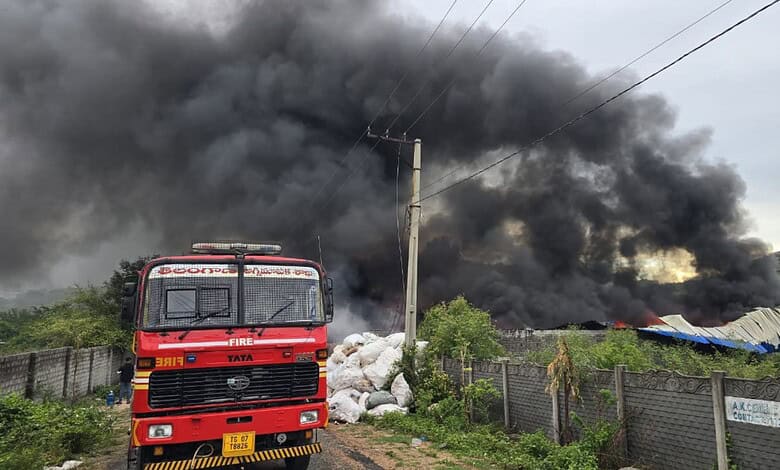Fire at a plastic unit in Hyderabad with thick black smoke billowing into the sky.