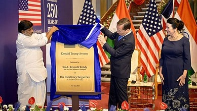Unveiling of the Donald Trump Avenue plaque in Hyderabad with officials and flags.