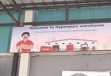 Welcome to Hyperpure warehouse with food safety and quality assurance signs.