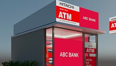 Modern ATM kiosk with ABC Bank branding and Hitachi Money Spot signage.