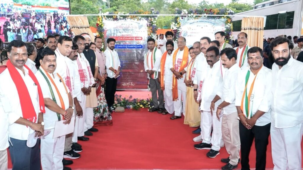 Politicians and officials at the inauguration of the SLBC building in India.