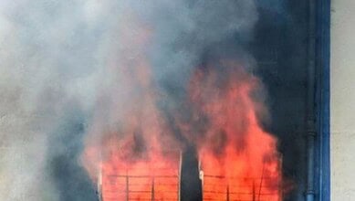 Flames erupting from a building in Delhi
