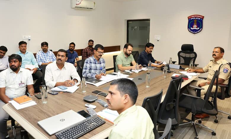 Cyberabad Police review flood-prone areas ahead of monsoon in a meeting room.