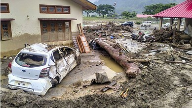 Damaged car and debris after landslides in Arunachal Pradesh due to monsoon rains.
