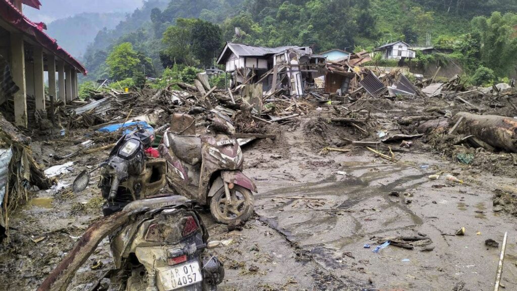 Severe landslide in Arunachal causing destruction to roads, bridges, and vehicles.