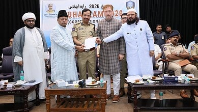 Officials and police officers at a formal event, exchanging documents on stage during a public ceremony i.