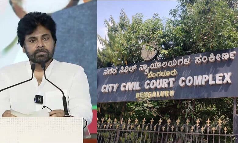 Andhra Dy CM Pawan Kalyan at a press conference with a city civil court sign in the background.