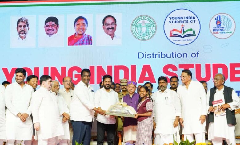 Telangana CM Revanth Reddy during the handing over of Young India kits at LB stadium in Hyderabad along with other officials.