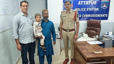Father, police officer, and child at Attapur Police Station in Hyderabad.