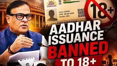 A man speaking at a press conference about banning Aadhar card issuance for individuals aged 18 and above.