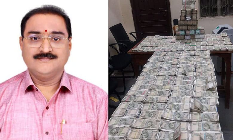 Seized cash and land survey official involved in corruption case in Telangana.
