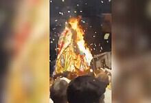 Chariot on fire during Muharram procession in Telangana's Adilabad, no injuries reported.