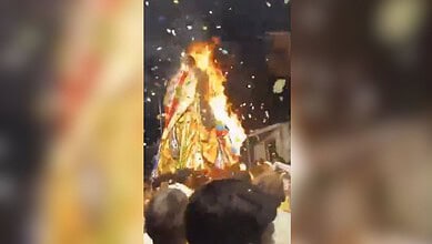 Chariot on fire during Muharram procession in Telangana's Adilabad, no injuries reported.