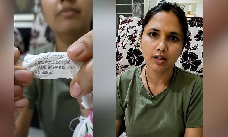 Woman holding a torn medical mask, explaining health concerns in an interview setting.