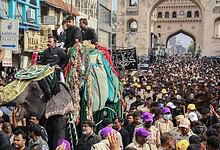 Large crowd gathers for Bibi-ka-Alam procession during Muharram in Hyderabad.