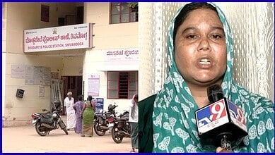 Police station in Shivamogga with people and motorcycles outside.