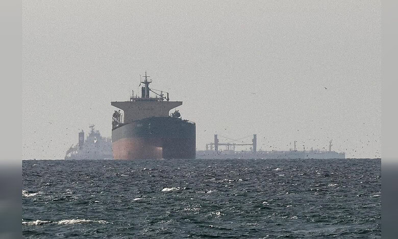Oil tanker navigating the ocean with a clear sky, showcasing maritime industry and shipping logistics.