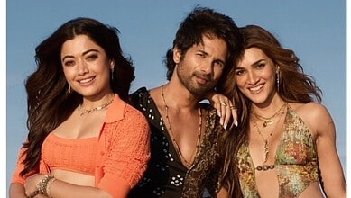 Shahid, Kriti, and Rashmika smiling together at a promotional event.