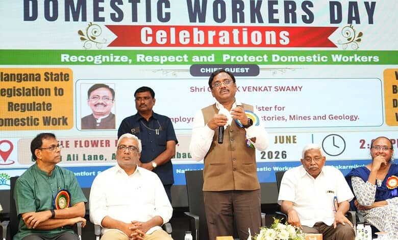 Telangana government hosts Domestic Workers Day celebration with speakers and attendees.