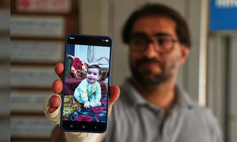 Child taking a selfie with a smartphone in a library setting.
