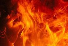 Fire flames with intense orange and yellow hues, creating a dynamic and energetic visual.