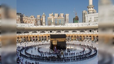 Pilgrims gather around the Kaaba during the ceremonial washing at Makkah's Grand Mosque.