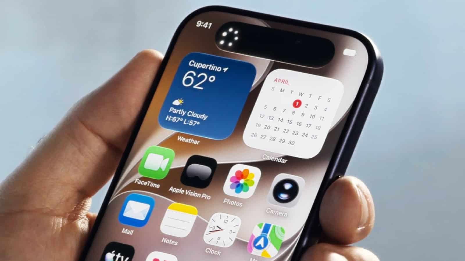 Smartphone displaying weather, calendar, and app icons, held in a person's hand against a blurred outdoor.