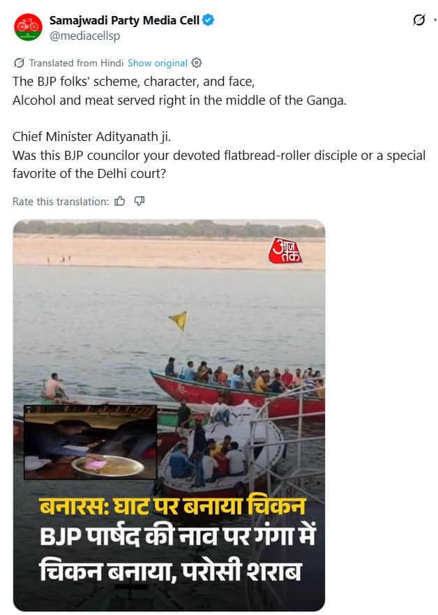 Group of people celebrating a party with chicken and beer, Ganga river in the background.