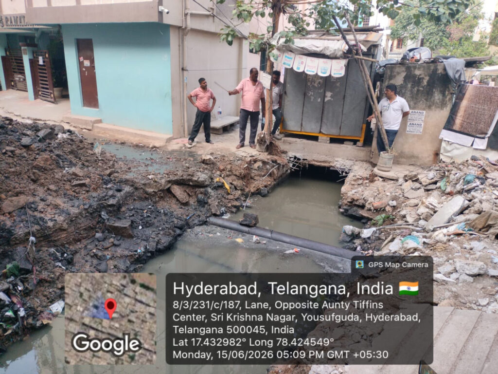 Community cleanup of drains by HYDRAA removing cables, plastic, and sofas.