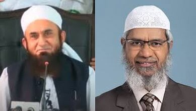 Prominent Muslim scholar speaking at a conference, wearing traditional attire and a white cap.