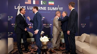 US Vice President JD Vance greets Pakistan Prime Minister Shehbaz Sharif as officials meet during the Lake Lucerne Summit at Bürgenstock Resort, Switzerland.