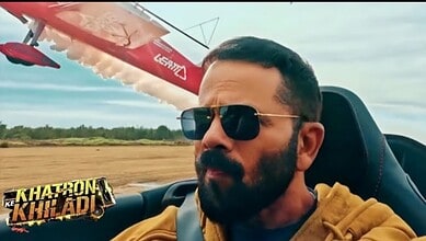 Man with sunglasses flying in a small aircraft during Khatron Ke Khiladi 15.