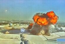 Explosion at industrial site with large fire and smoke cloud.