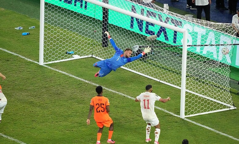 Moroccan goalkeeper makes a save during a World Cup shootout match.