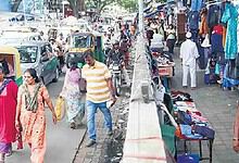 Bengaluru footpath encroachments put pedestrians at risk