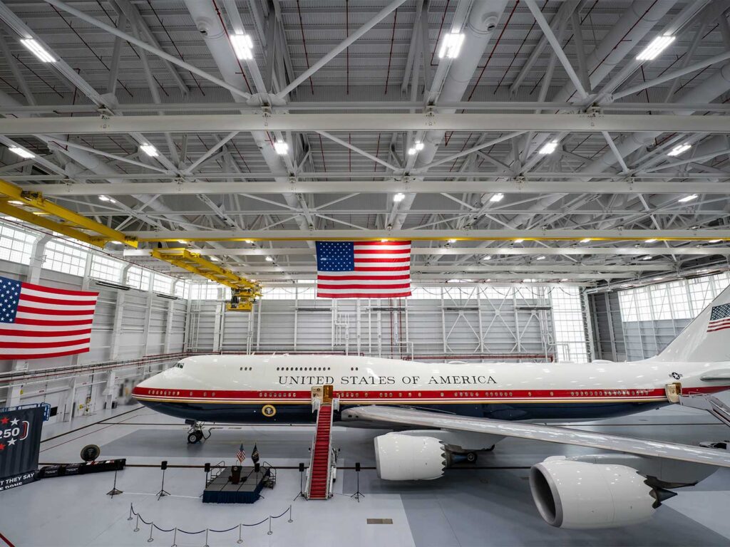 A refurbished Boeing 747-8i formerly owned by Qatar is displayed inside a hangar before entering service as an interim Air Force One.
