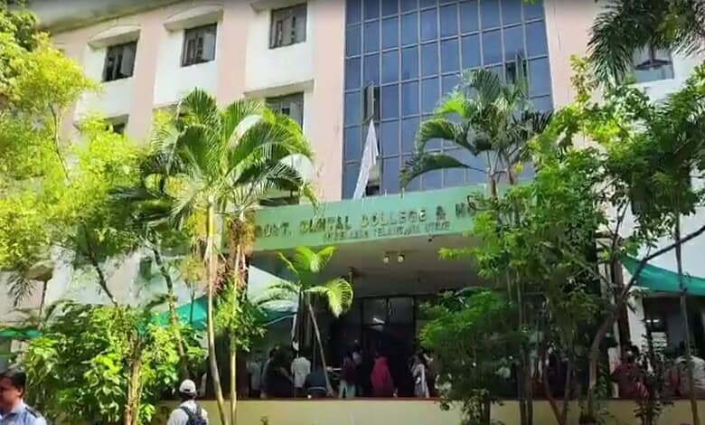 Students entering Osmania Medical College amid lush greenery and tall trees.