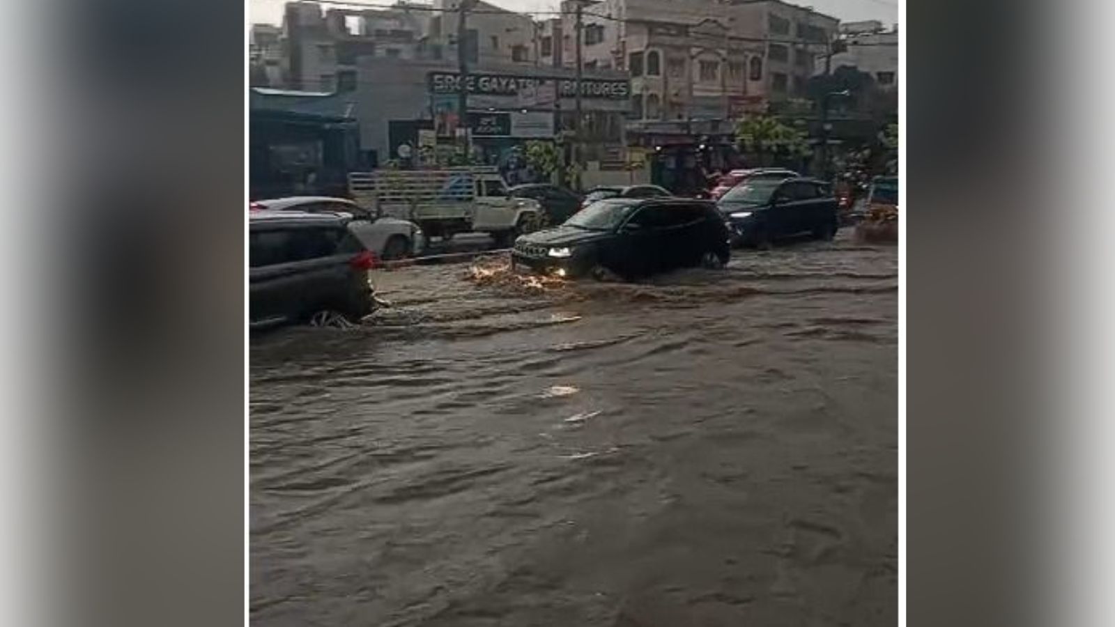 Car wades through water as Hyderabad floods in pre-monsoon rains