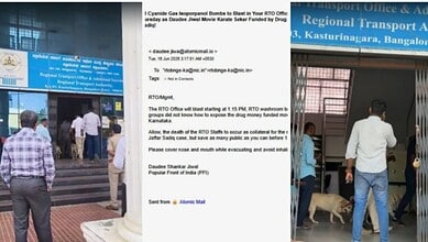 People outside Bengaluru RTO office following bomb threat email alert, some with police and security.