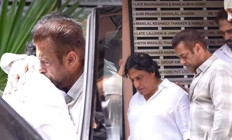 A woman and two men inspecting documents outside The Siasat Daily office in India.