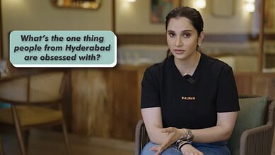 Sania Mirza in a black t-shirt sitting in a cafe with a speech bubble about Hyderabadis' obsession.