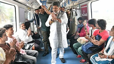 A man in traditional attire leading a prayer on a crowded bus with diverse passengers.