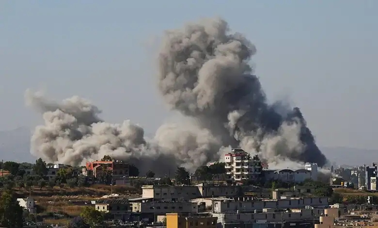 Large smoke clouds rise from buildings in Lebanon after Israeli strikes, despite ceasefire efforts.