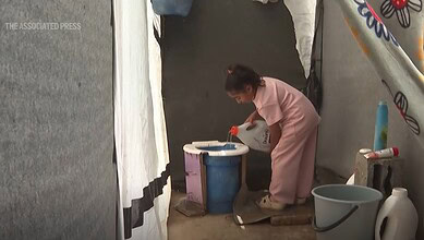 Makeshift toilets in Gaza tents (Image: AP)