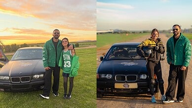 Two men and two women posing with a black BMW car outdoors at sunset and daytime.